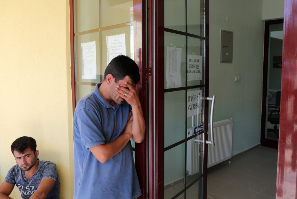 Abdullah Kurdi, 40, father of Syrian boys Aylan, 3, and Galip, 5, who were washed up drowned on a beach near Turkish resort of Bodrum on Wednesday, waits for the delivery of their bodies outside a morgue in Mugla, Turkey, Thursday, Sept. 3, 2015. Images of Aylan’s body on the beach, have heightened global attention to a wave of migration, driven by war and deprivation, that is unparalleled since World War II. (Tolga Adanali/Depo Photos via AP)